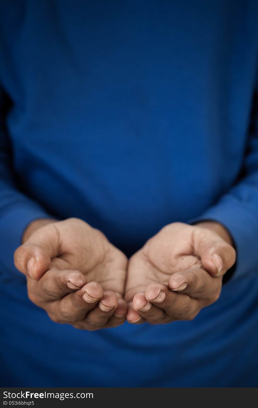 Two dirty hands of a poor person in prayer position. Two dirty hands of a poor person in prayer position