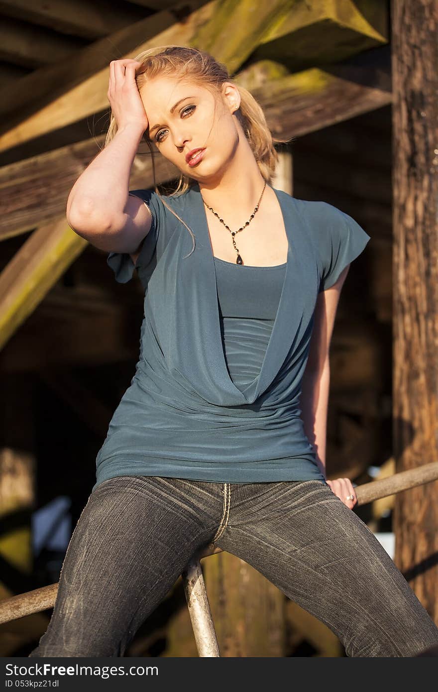 Portrait of a young woman staring straight ahead into the camera. Portrait of a young woman staring straight ahead into the camera