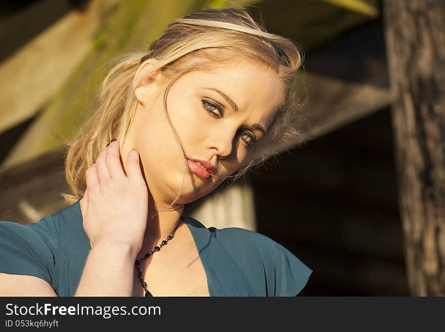 Portrait of a young woman staring straight ahead into the camera. Portrait of a young woman staring straight ahead into the camera