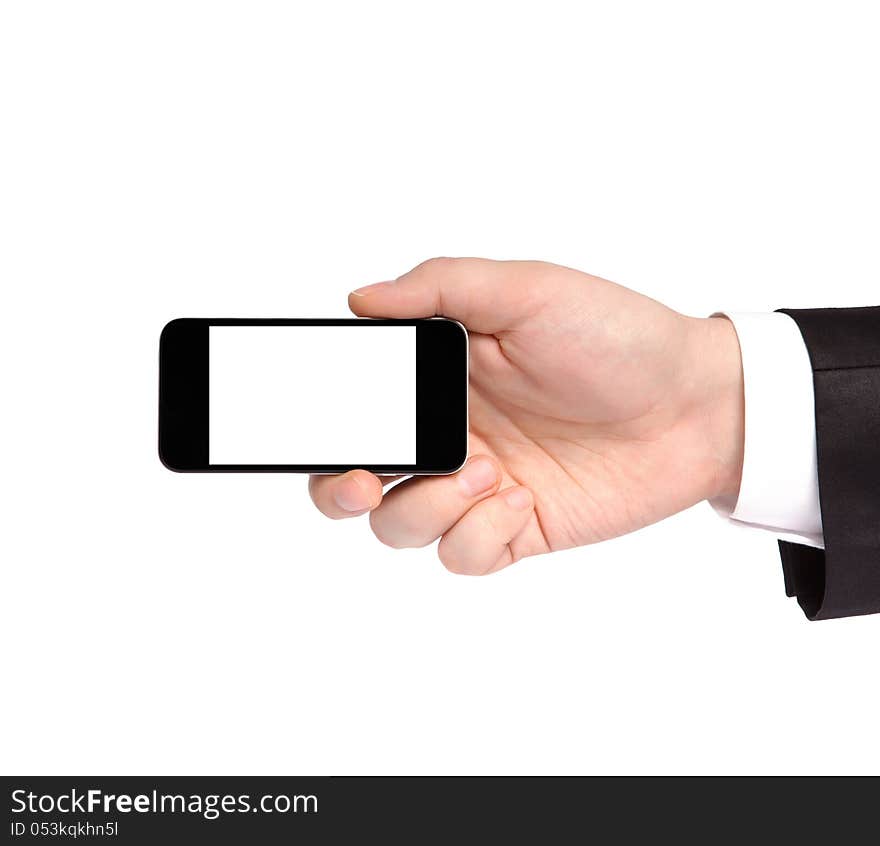 Hand of a businessman in a suit holding a phone with isolated di