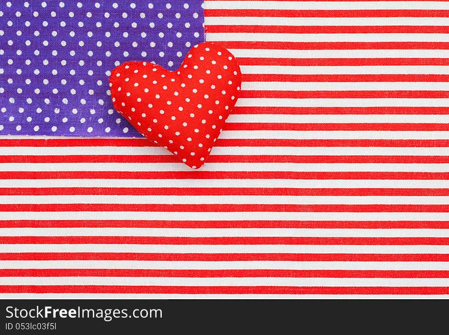 Blue polka dots and Red/white Striped Fabrics as American flag. Stuffed handmade heart. Blue polka dots and Red/white Striped Fabrics as American flag. Stuffed handmade heart