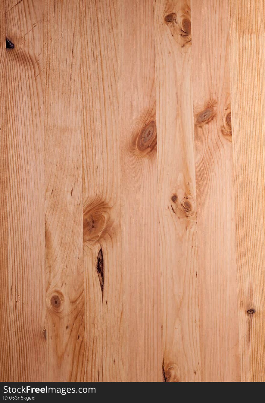 Set of treated pine boards with knots