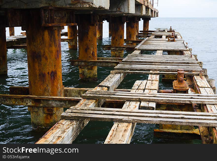 Deserted old bridge floor. rusty and unusable. ferroconcrete construction