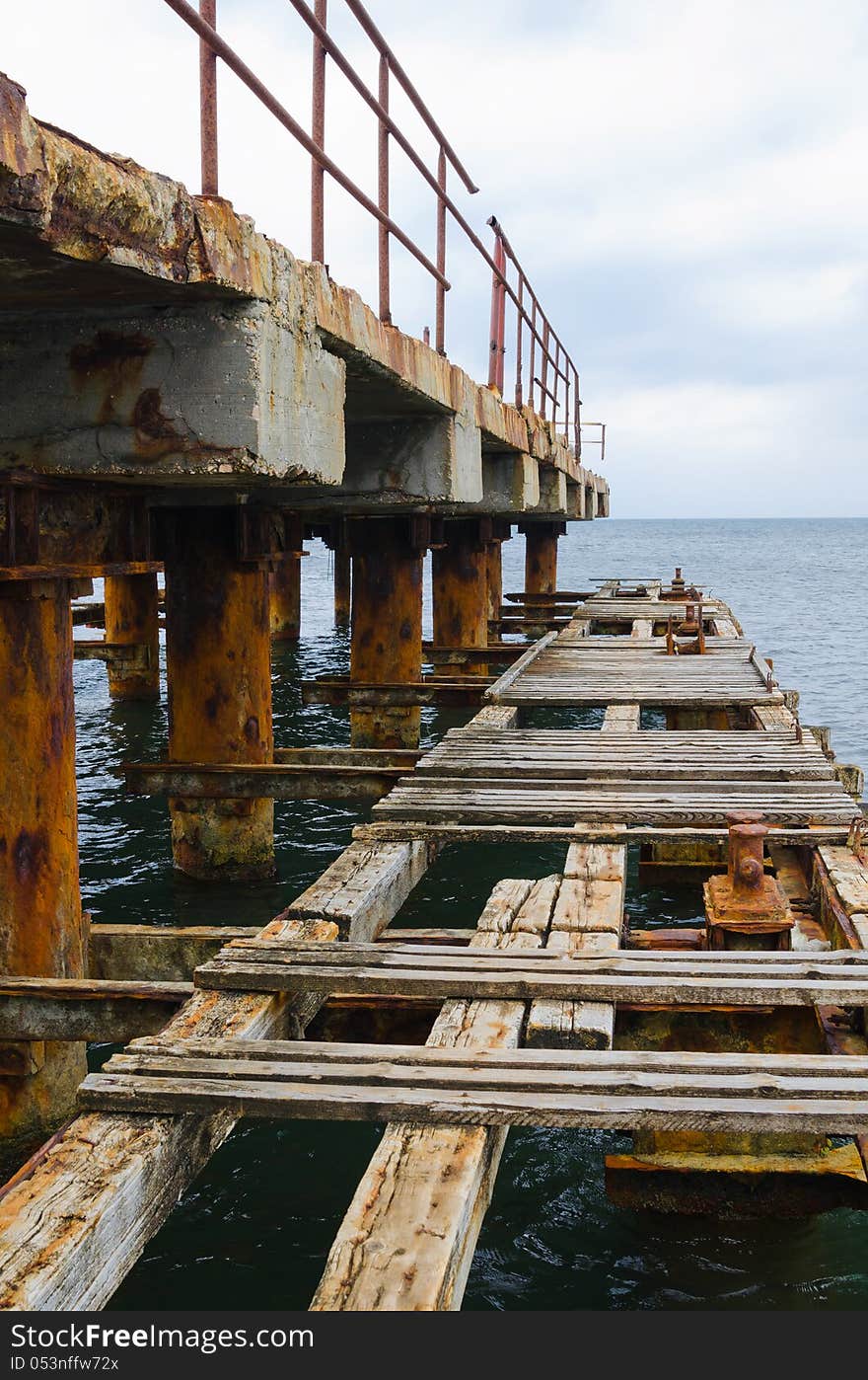 Deserted old bridge floor. rusty and unusable. ferroconcrete construction