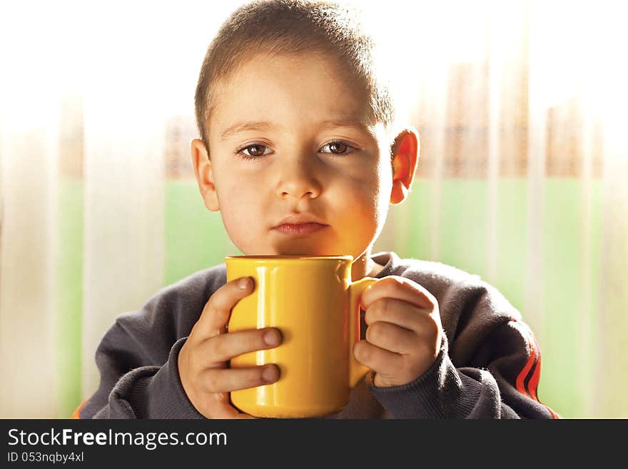 Child drinking tea