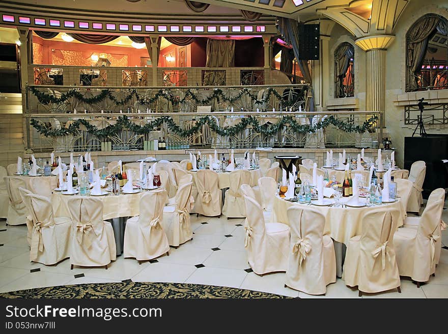 Restaurant interior with served tables for celebration