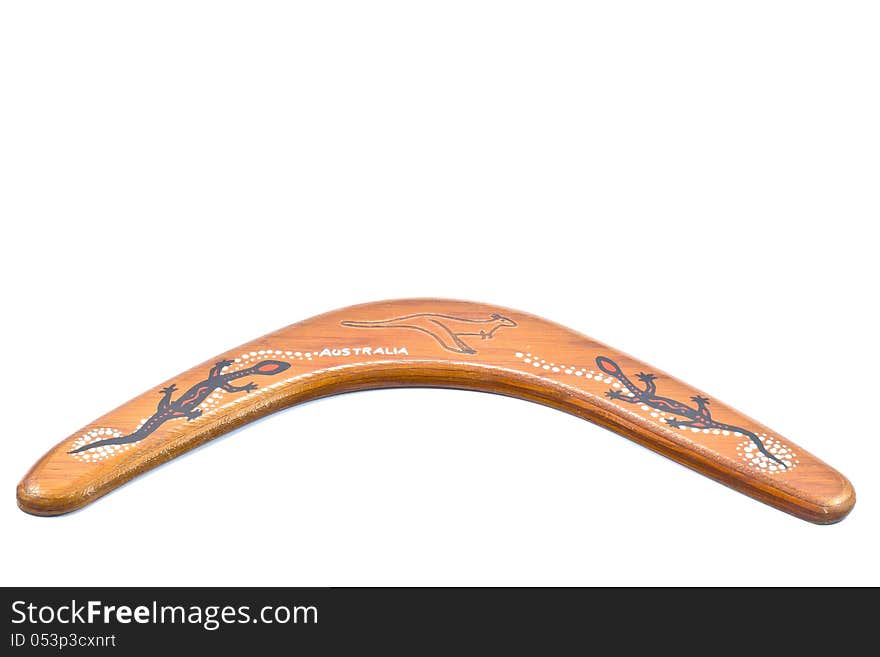 Wooden boomerang from Australia with white background