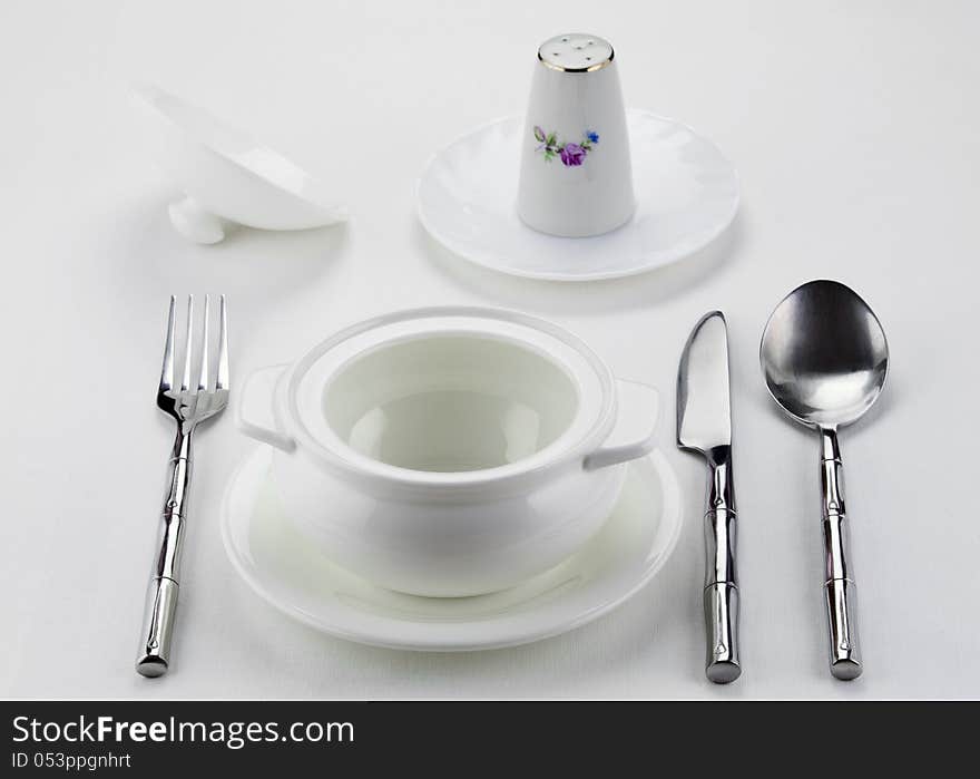 Tureen, salt shaker and cutlery