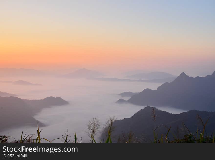 Mist before sunset between moutains