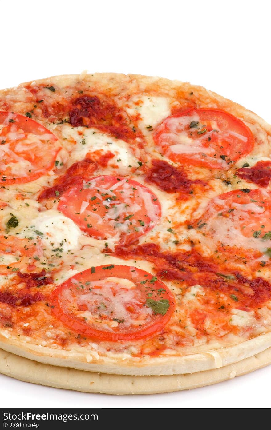 Cheese and Tomatoes Pizza with Spices and Greens closeup on white background. Cheese and Tomatoes Pizza with Spices and Greens closeup on white background