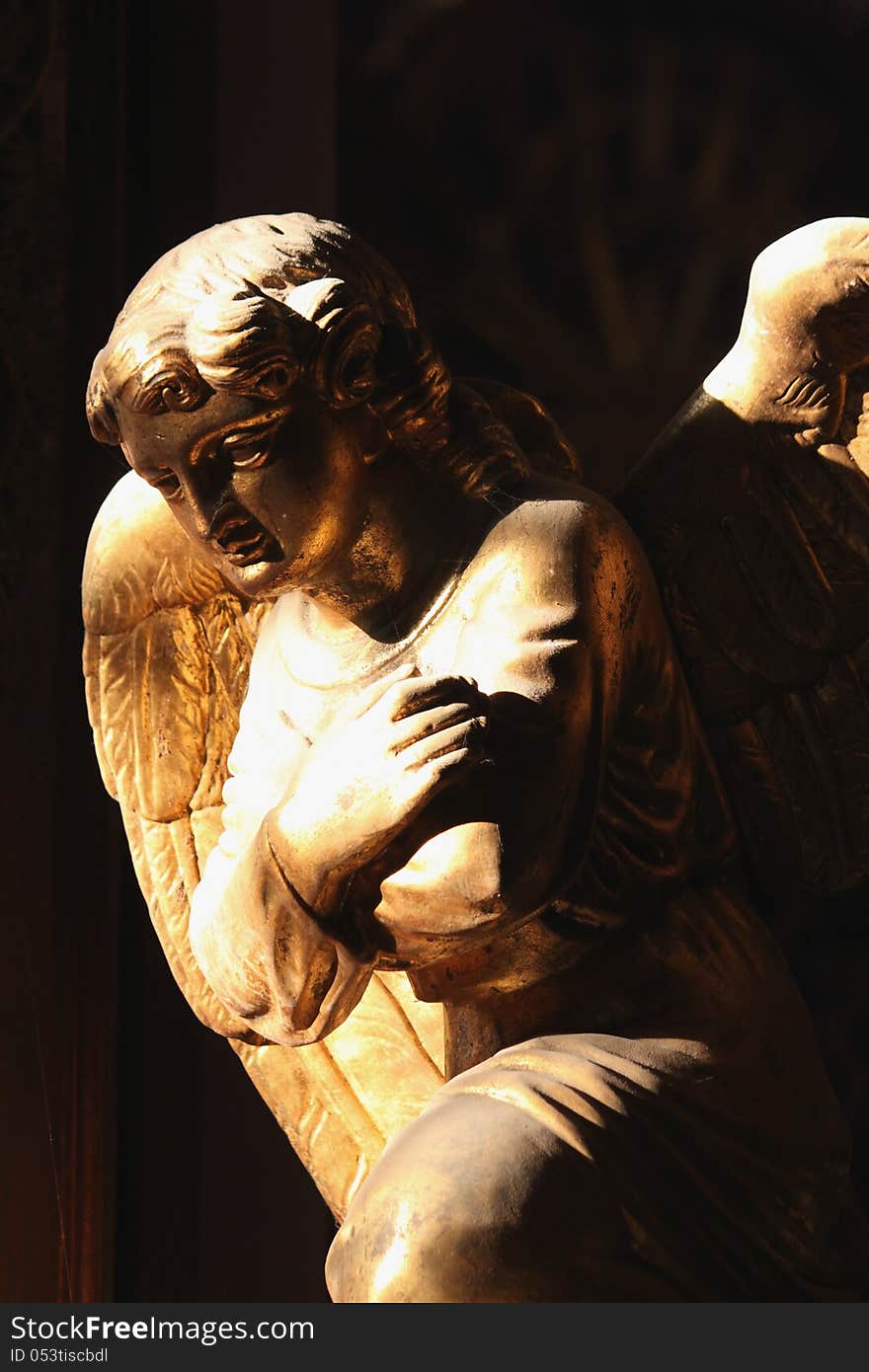 Figure Of A Praying Angel