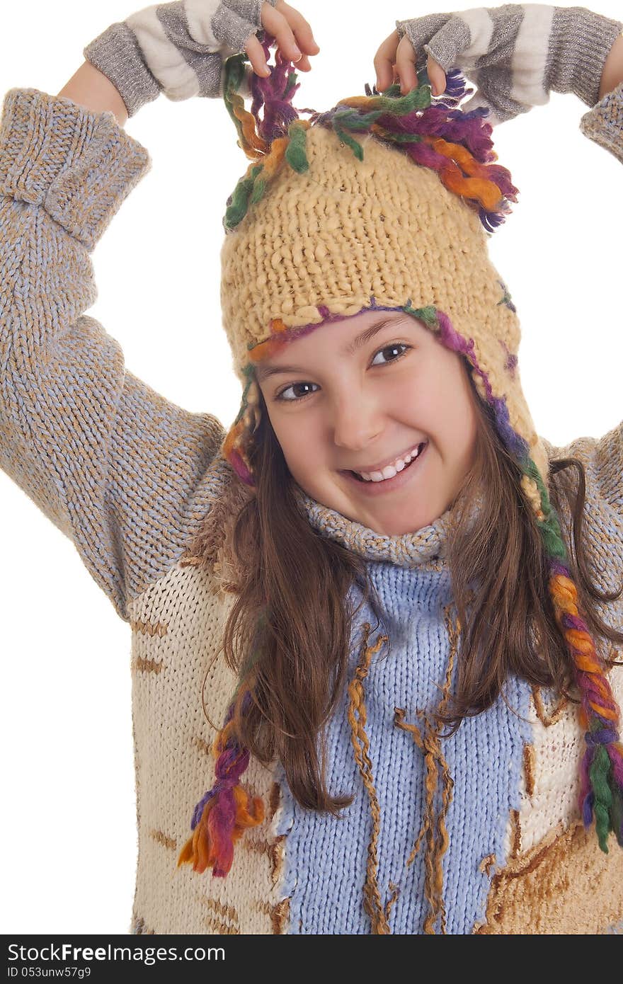 Beautiful young girl in warm winter clothes