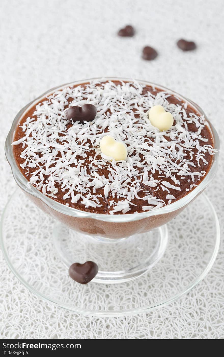 Chocolate mousse with chocolate hearts decorated with coconut