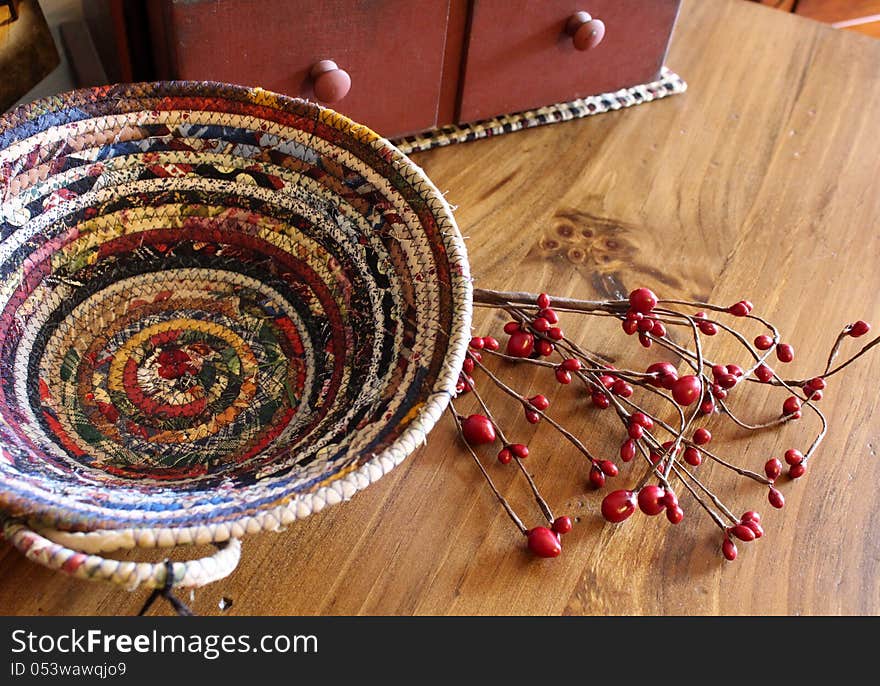 Braided Colorful Basket On Wood Table