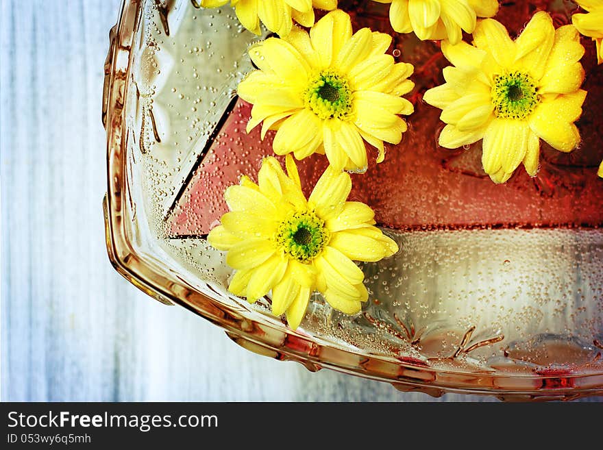 Yellow flower background with water