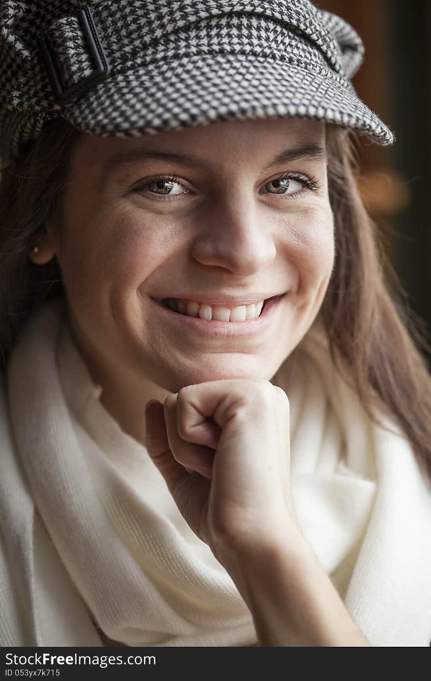 Portrait of a young woman staring straight ahead into the camera. Portrait of a young woman staring straight ahead into the camera