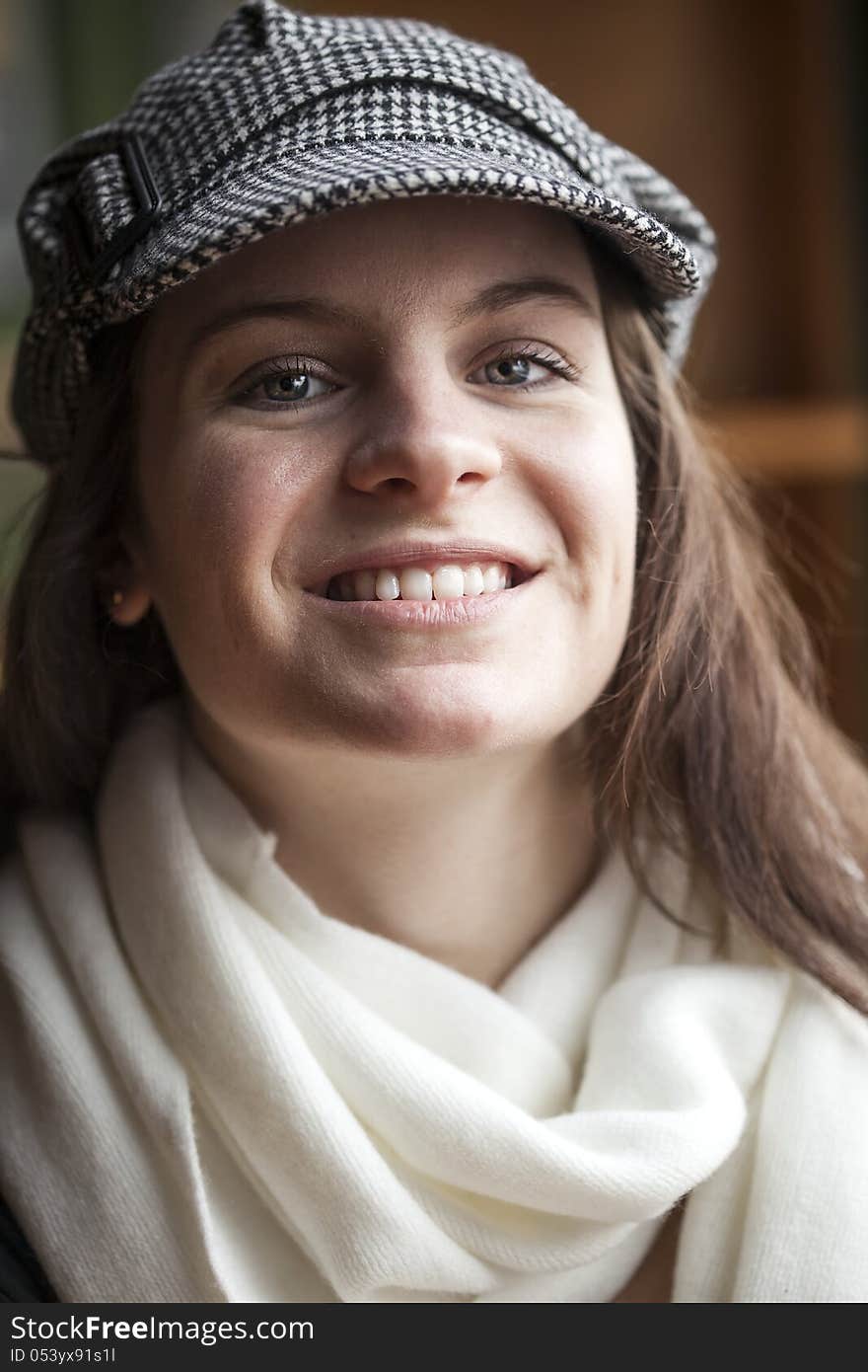 Portrait of a young woman staring straight ahead into the camera. Portrait of a young woman staring straight ahead into the camera