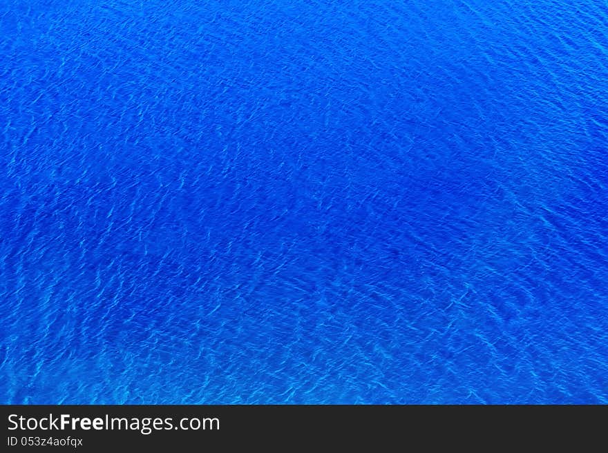 Uneven abstract the texture of bright blue color. Uneven abstract the texture of bright blue color