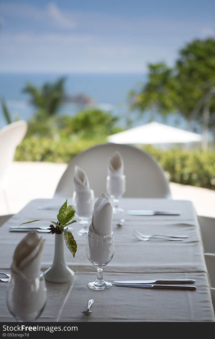 Chairs and table set up for dinner on luxury resort in Costa Rica. Chairs and table set up for dinner on luxury resort in Costa Rica