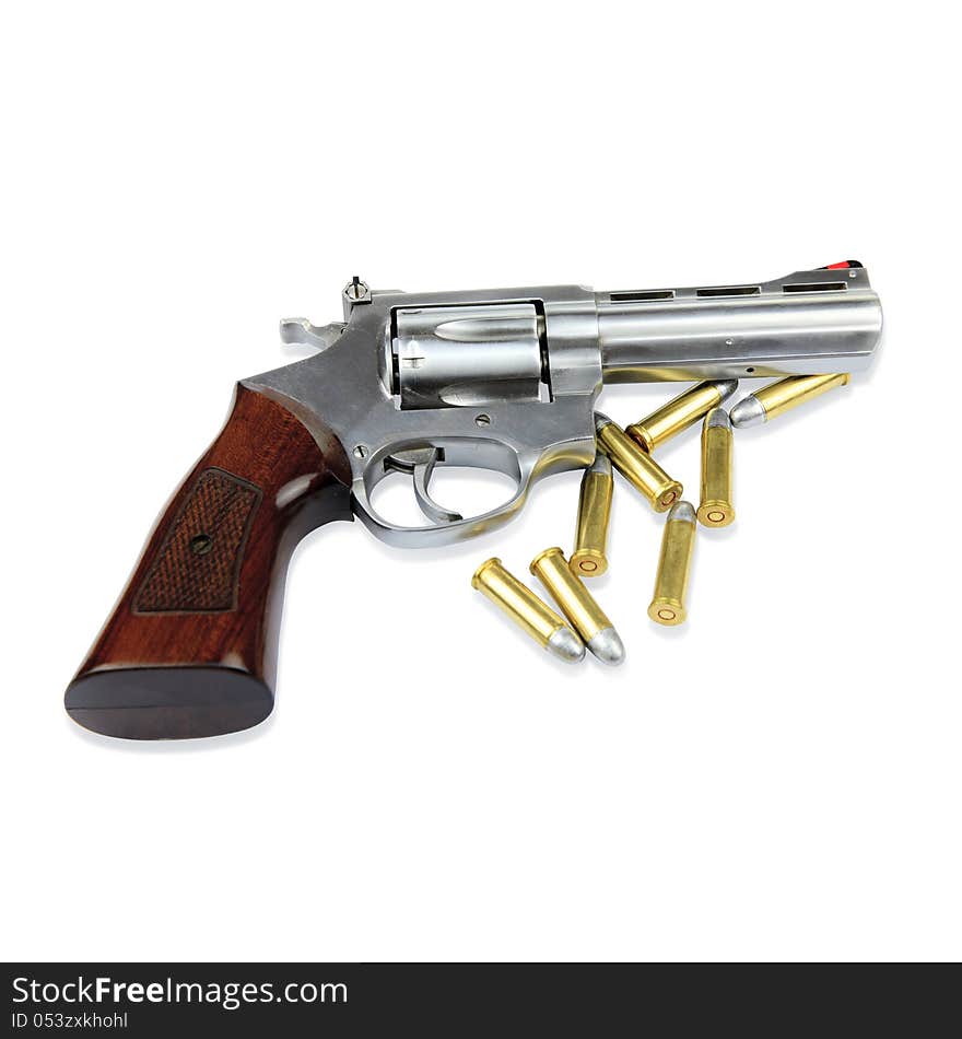 Gun and bullets on white background