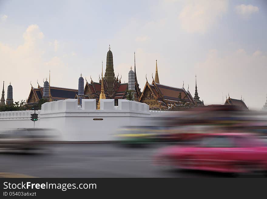 Blurred car on the street in front of Wat Phra Kaew Temple in bangkok thailand