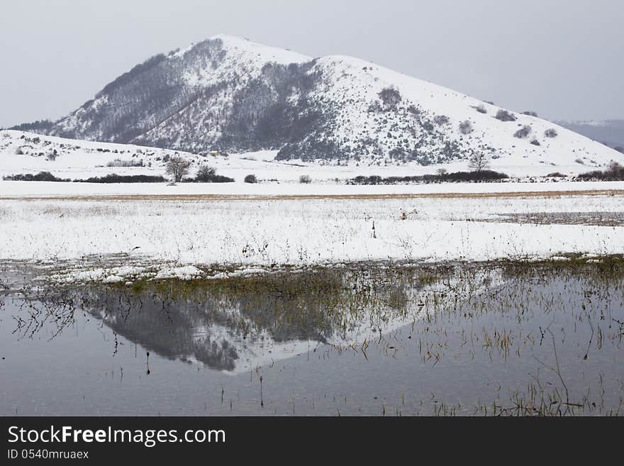 Reflects of the mountain in the lake