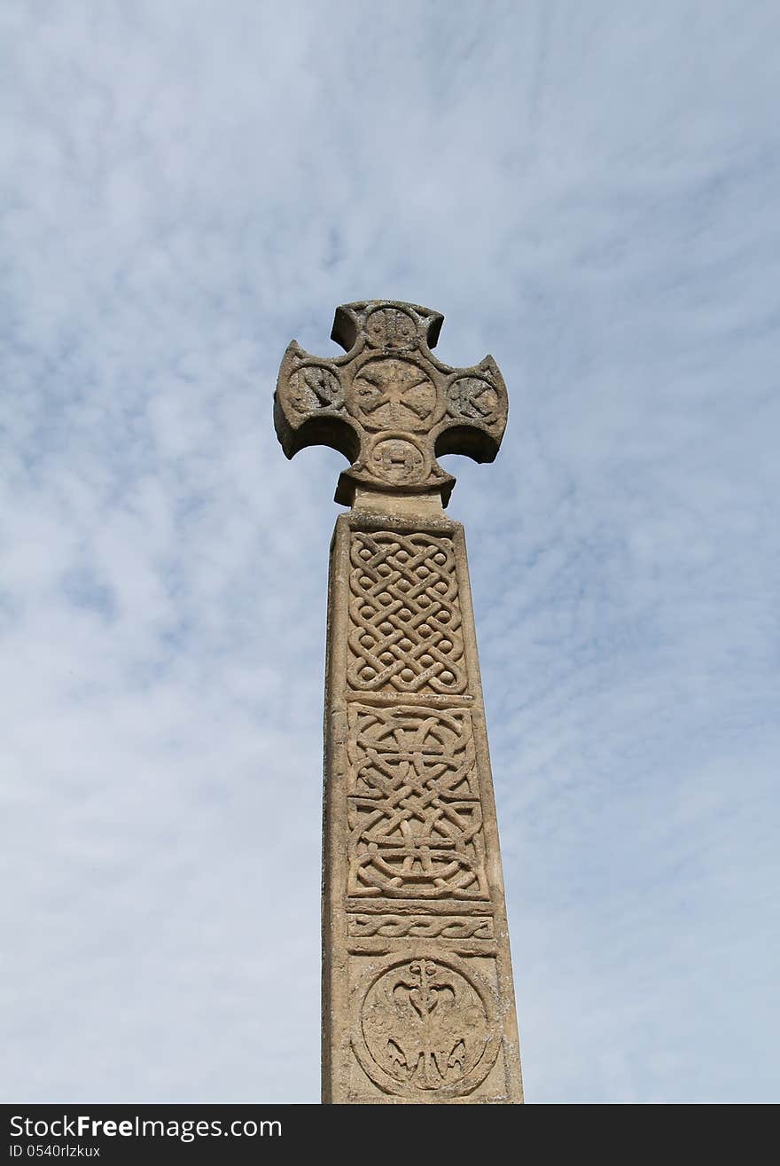 A Tall Stone Made Historical Cross Memorial.