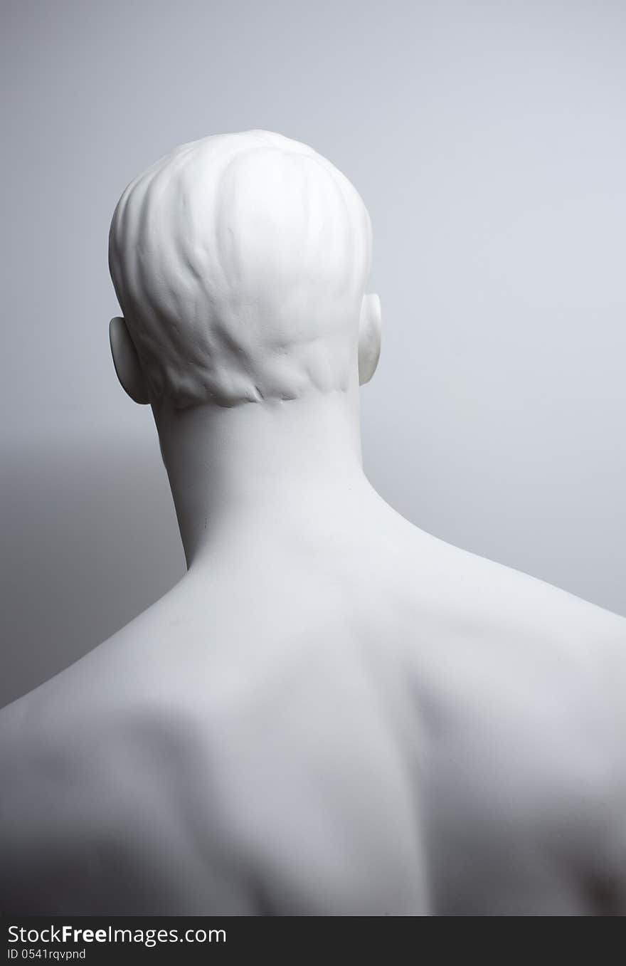 White mannequin of a man back. White mannequin of a man back