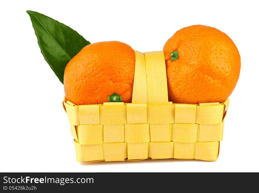 Tangerine in basket  on white