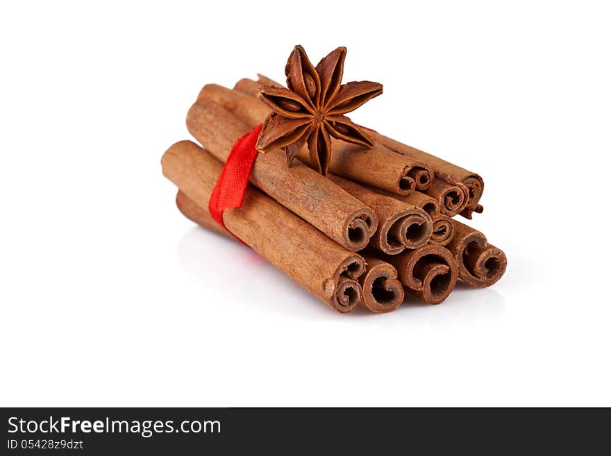 Cinnamon and anise  on white background