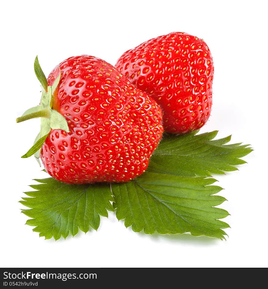 Fresh strawberry with leaf isolated on white background