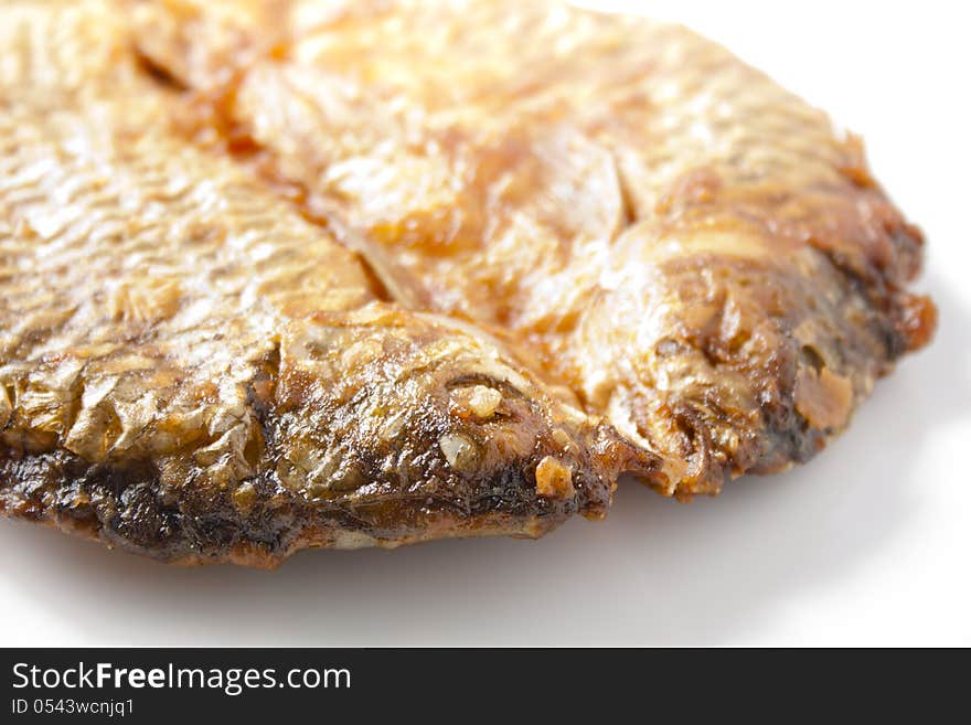 Closeup Dried fish fried on white.