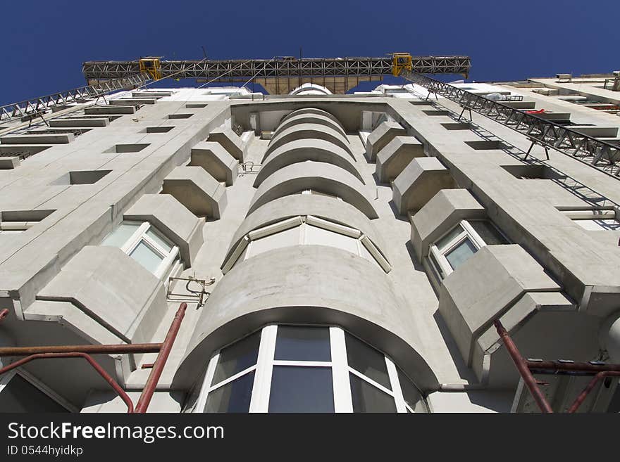 Scaffold elevators and a buiding being constructed. Scaffold elevators and a buiding being constructed