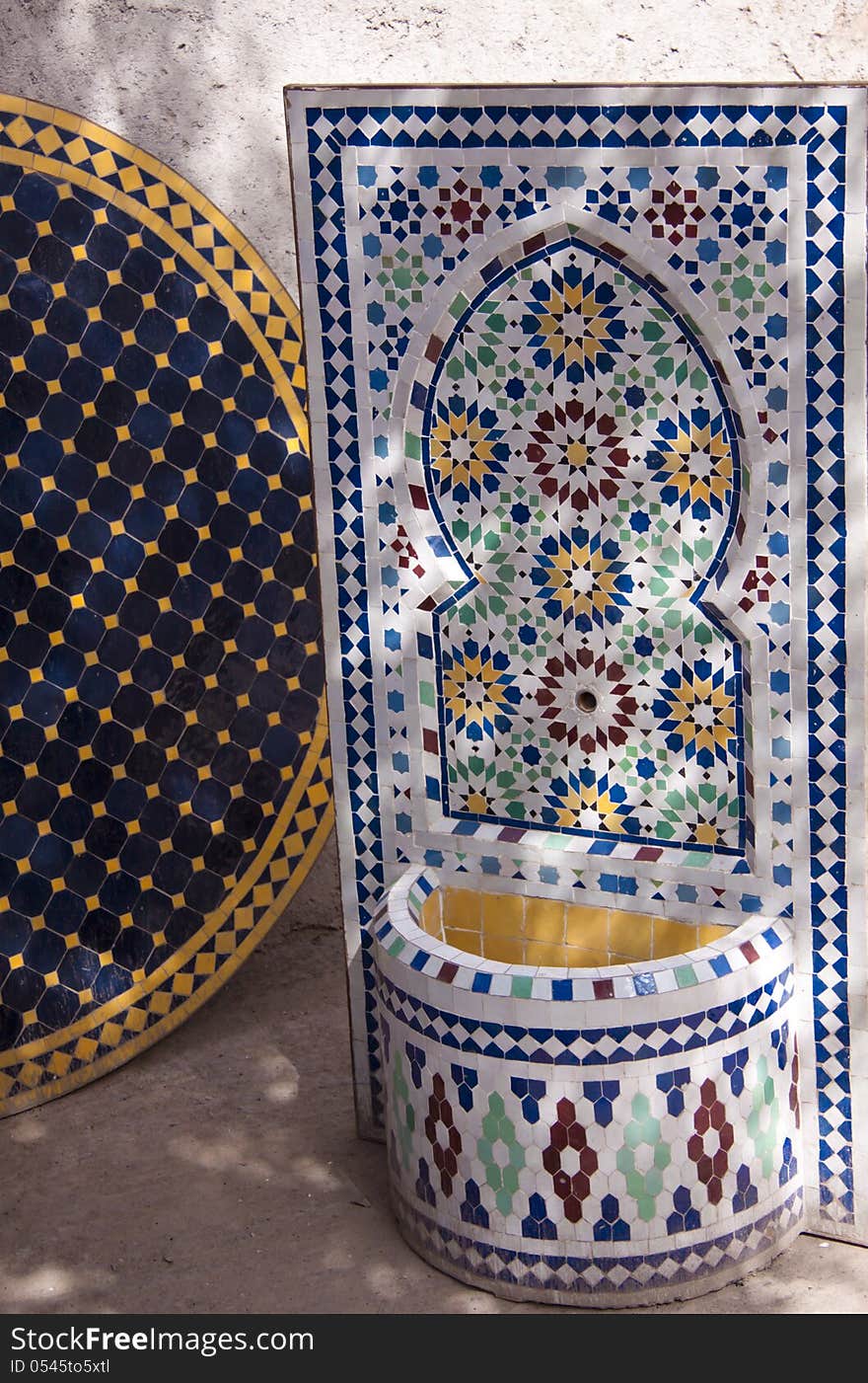 Home fountain and table of Moroccan mosaics