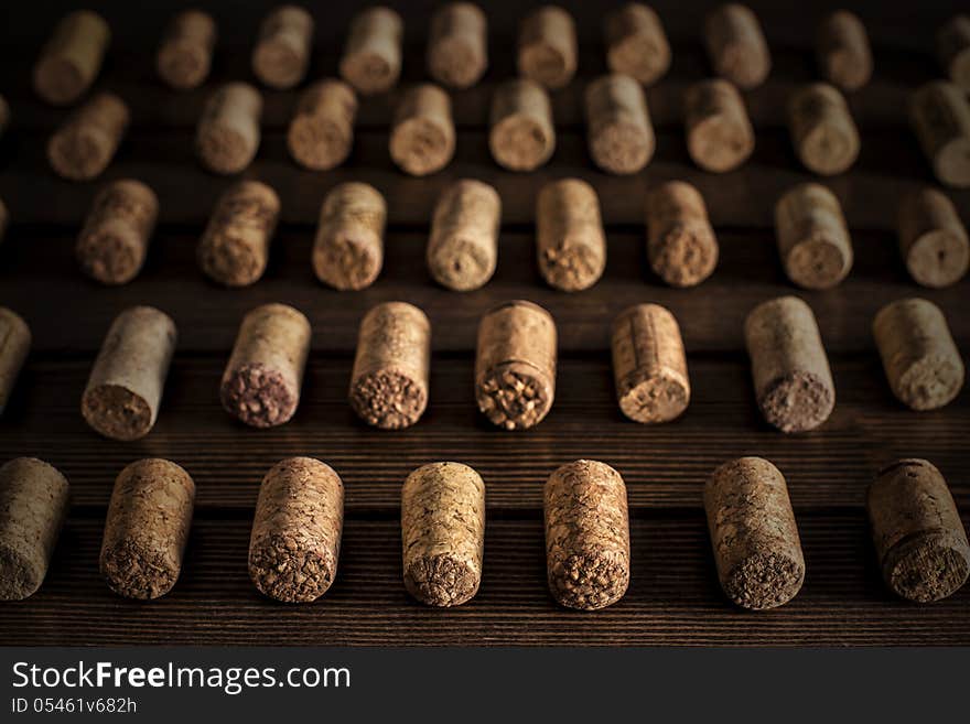 Set of wine plugs correctly lying on black background