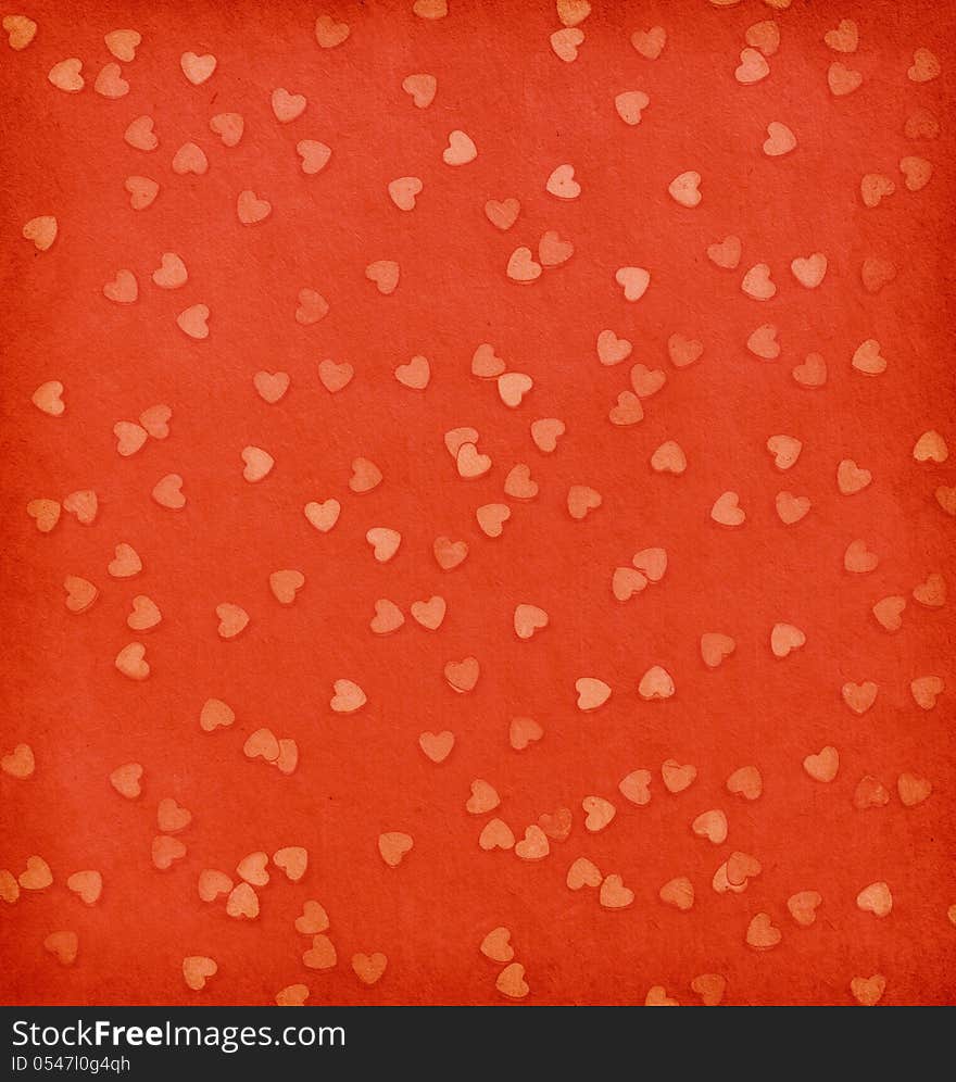 Aged paper texture.  Hearts on  red paper. Aged paper texture.  Hearts on  red paper.