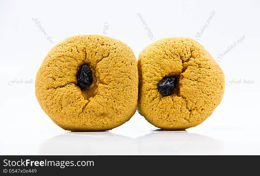 Raisin cupcakes on a white background