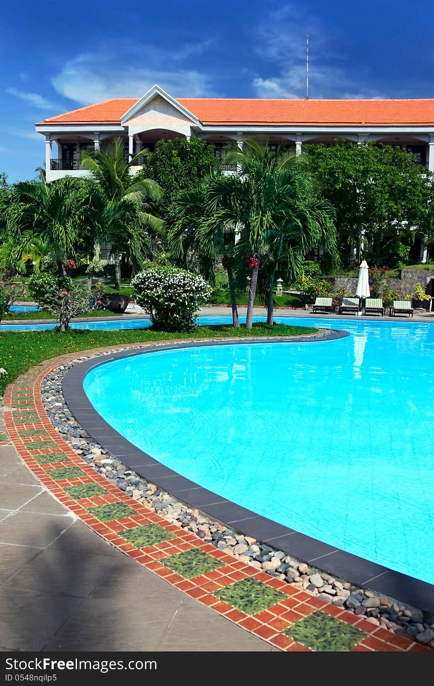 Beautiful tropical swimming pool at luxury resort. Beautiful tropical swimming pool at luxury resort