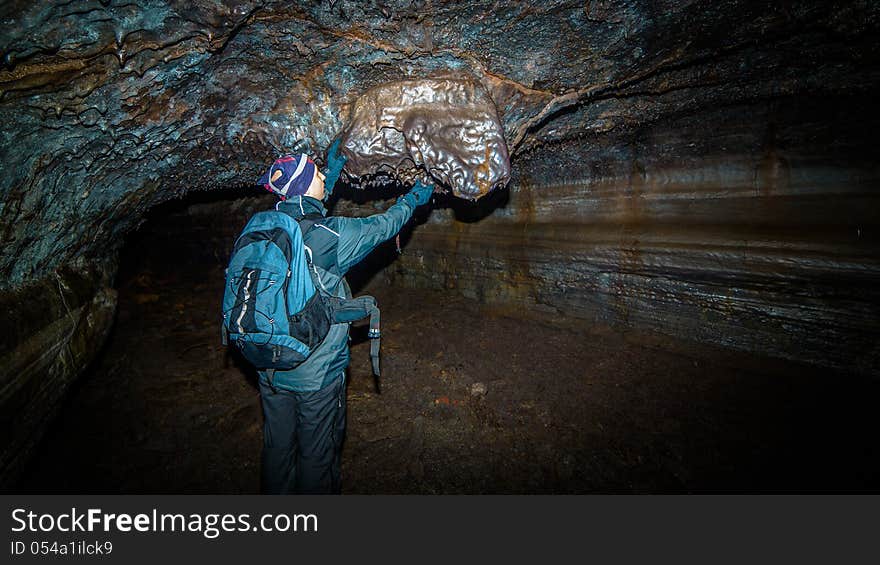 A man in an underground tunnel.