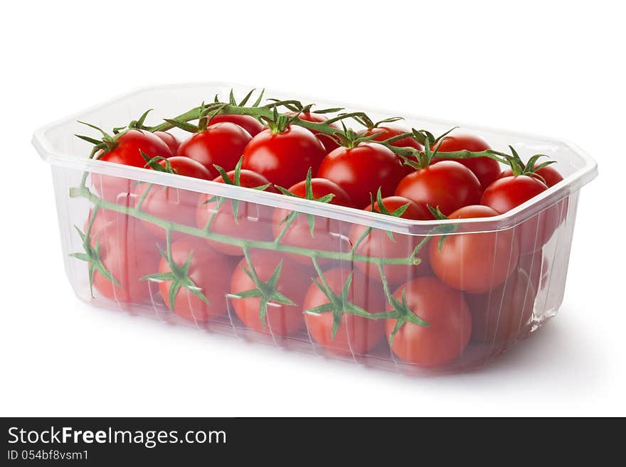 Cherry tomatoes on a branch in retail packaging