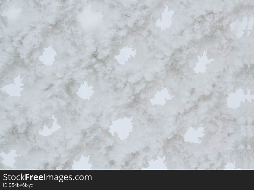 Snow piled on the wires of a chain link fence for background