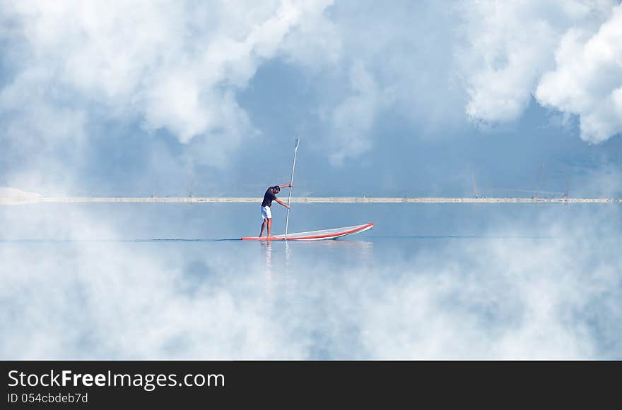 Guy surfing vacation at sea tourism