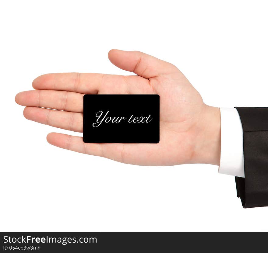 Isolated hand of a businessman in a suit holding a black business card. Isolated hand of a businessman in a suit holding a black business card