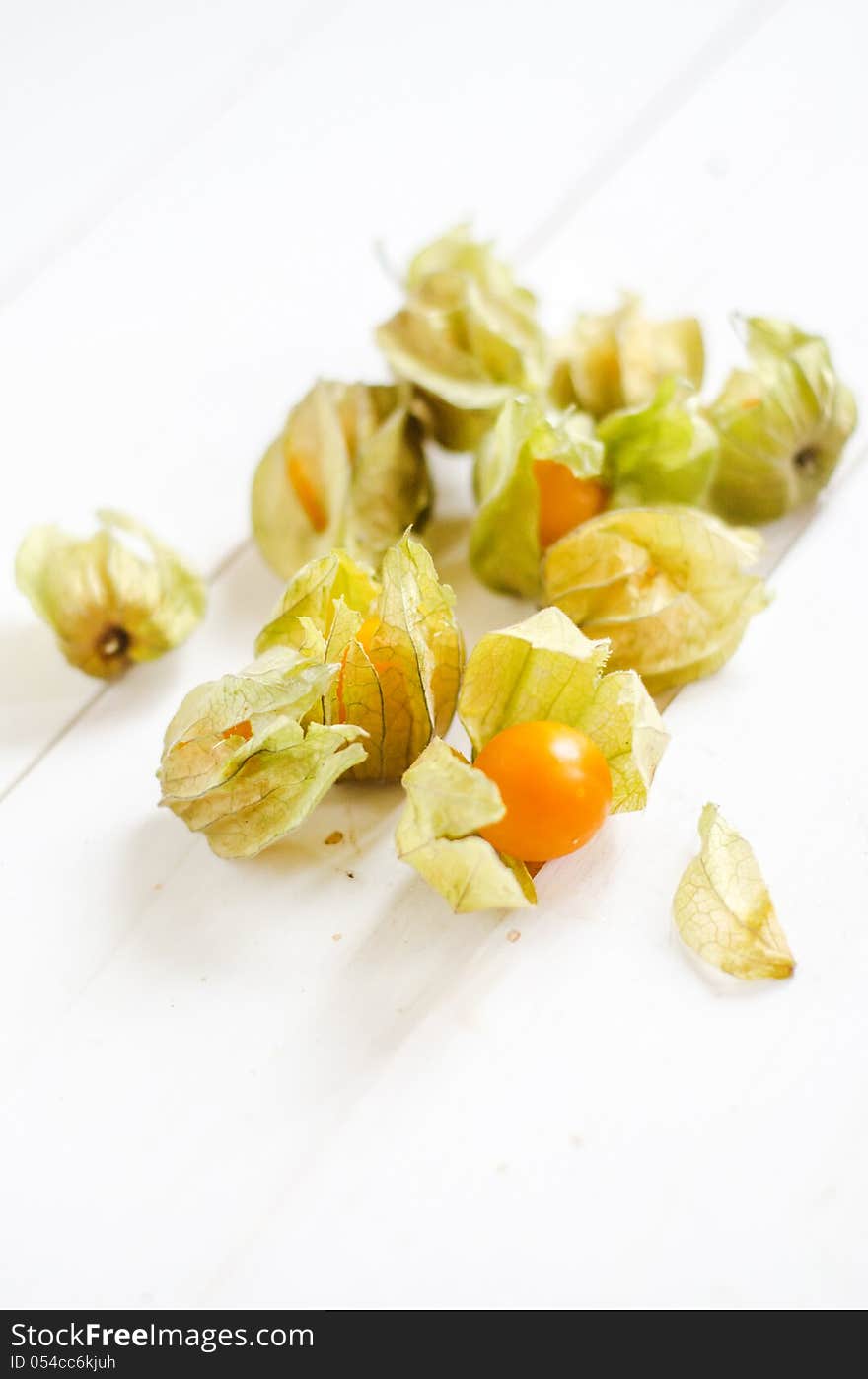 Cape Gooseberry- Physalis peruviana on a white wooden table