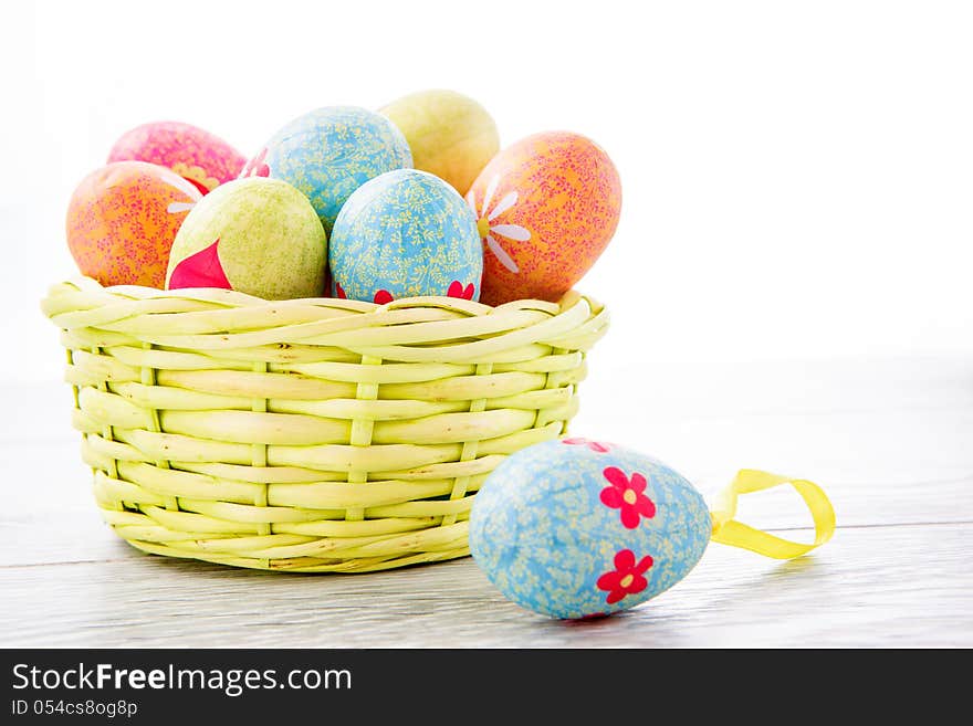 Colorful Easter eggs in a basket