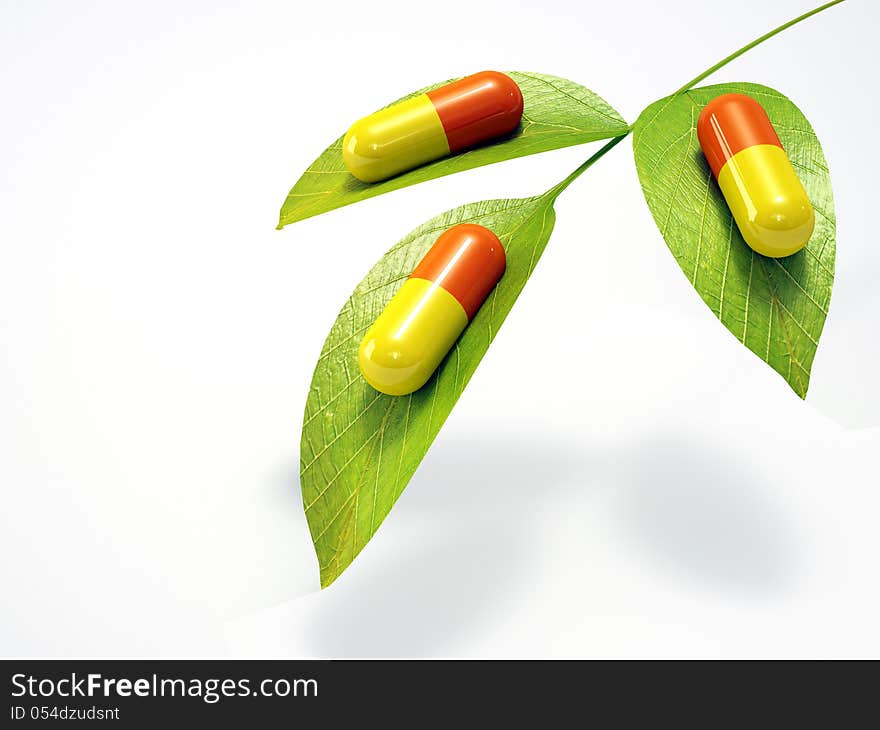 Capsules with green Leaves on white background