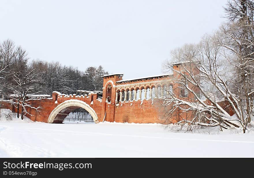 Brick bridge of the eighteenth-century of red color in the old manor. Brick bridge of the eighteenth-century of red color in the old manor