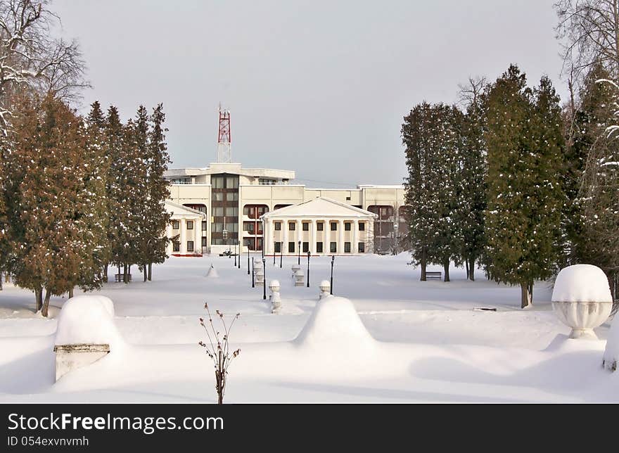 Complex of white buildings in the winter park. Complex of white buildings in the winter park