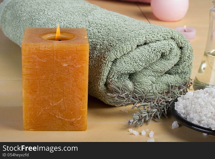 Aromatic spa set with sea salt and colored candles.