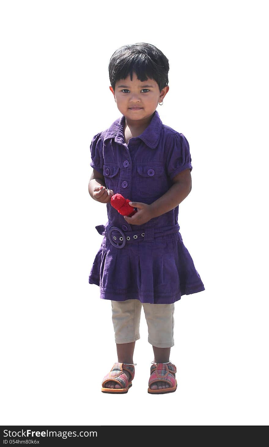 Happy and smiling cute young girl(kid) isolated on white background. The beautiful Indian kid is 2 years old. Happy and smiling cute young girl(kid) isolated on white background. The beautiful Indian kid is 2 years old.